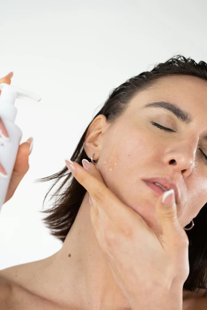 Woman receiving facial